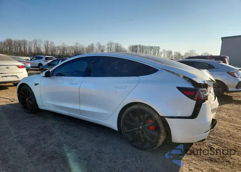 2020 Tesla Model 3 из США, поврежденный, VIN 5YJ3E1ECXLF719477